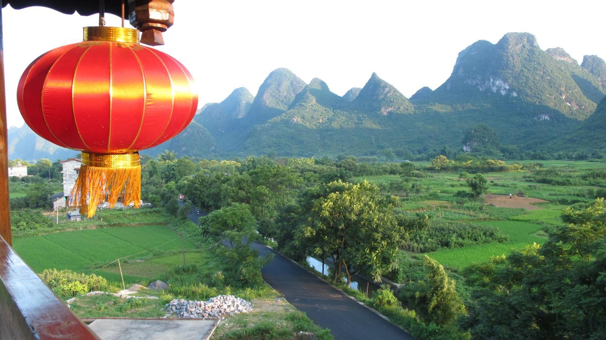 Yangshuo Tea Cozy--One Way Free Pick Up From Airport Or Ts 4 Nights Pensionat Eksteriør billede